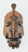 A 20TH CENTURY VINTAGE AFRICAN TRIBAL WOODED CARVED CEREMONIAL MASK
