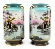 PAIR OF 20TH CENTURY CAMEO WARE POTTERY TWIN HANDLED VASES