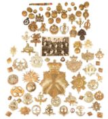 COLLECTION OF ASSORTED WORLD WAR MILITARY CAP BADGE