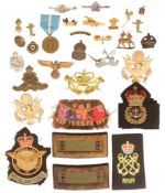 COLLECTION OF ASSORTED MILITARY BADGES & PATCHES