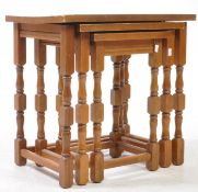 20TH CENTURY JACOBEAN REVIVAL OAK NEST OF TABLES