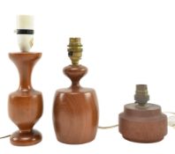 THREE MID CENTURY SOLID TEAK TABLE LAMPS