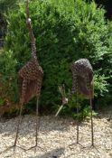 TWO VINTAGE CAST METAL GARDEN HERON / STORK SCULPTURES