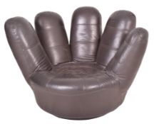 VINTAGE LATE 20TH CENTURY BROWN LEATHER HAND SHAPED ARMCHAIR