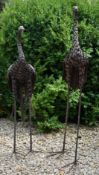 TWO VINTAGE CAST METAL GARDEN HERON / STORK SCULPTURES
