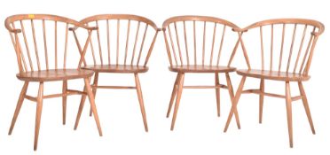 ERCOL - FOUR VINTAGE BEECH AND ELM COWHORN CARVER ARMCHAIRS