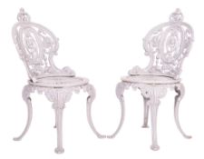 HEAVY PAIR OF 19TH CENTURY CAST IRON GARDEN CHAIRS