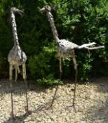 TWO VINTAGE CAST METAL GARDEN HERON / STORK SCULPTURES