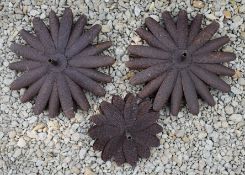 THREE VINTAGE GARDEN SCULPTURES OF FLOWER HEADS