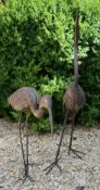 TWO VINTAGE CAST METAL GARDEN HERON / STORK SCULPTURES