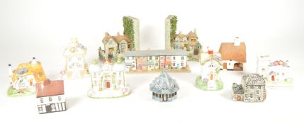 COLLECTION OF LATE 20TH CENTURY RESIN AND PORCELAIN COTTAGE HOUSES