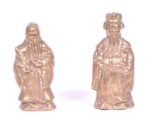 TWO 20TH CENTURY CHINESE BRASS DEITY FIGURES