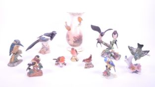 COLLECTION OF 20TH CENTURY PORCELAIN AND RESIN BIRD FIGURES