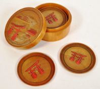 JAPANESE 20TH CENTURY WOODEN CIRCULAR BOXED SET OF COASTERS