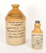 EARLY 20TH CENTURY STONEWARE WINE FLAGONS