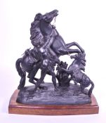 MANNER OF COUSTOU - 20TH CENTURY BRONZE MARLEY HORSE