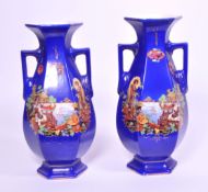 PAIR OF EDWARDIAN CERAMIC CHINOISERIE TWIN HANDLED VASES