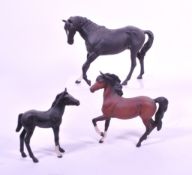 BESWICK - THREE MID CENTURY BISQUE PORCELAIN HORSE FIGURES