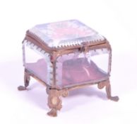 EARLY 20TH CENTURY EDWARDIAN BRASS AND GLAZED JEWELLERY CASKET