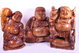 THREE LATE 20TH CENTURY CARVED HARDWOOD CHINESE BUDDHA FIGURES