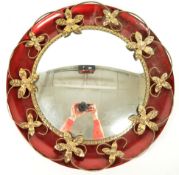1950S CONVEX MIRROR WITH GILT FOLIAGE DESIGN AND RED METAL BACKING
