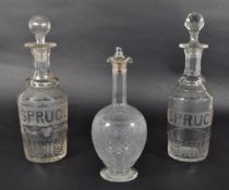 THREE LATE 19TH CENTURY CLEAR GLASS DECANTERS