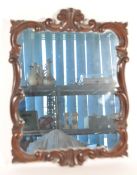 19TH CENTURY MAHOGANY ROCAILLE CARVED WALL MIRROR