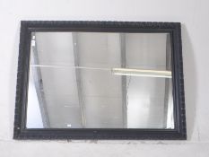 EBONIZED WOOD FRAMED HANGING MIRROR