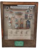 VINTAGE DISPLAY CASE SHOWING LEAD ACID ACCUMULATORS