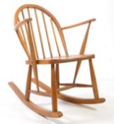 MANNER OF ERCOL - VINTAGE ELM ROCKING CHAIR