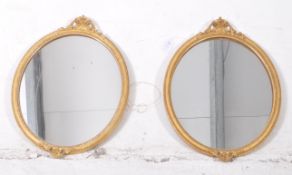TWO 19TH CENTURY FLORENTINE STYLE GILT OVAL MIRRORS
