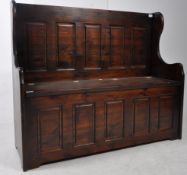 20TH CENTURY STAINED PINE MONKS HALL SETTLE BENCH