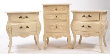 CHICHI - PAIR OF CARVED BOMBE PAINTED BEDSIDE CHEST OF DRAWERS