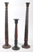 PAIR OF EARLY 20TH CENTURTY CARVED WOODEN TORCHERES