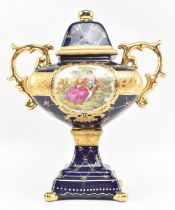 LIMOGES - 20TH CENTURY MODERN PORCELAIN TWIN HANDLED LIDDED URN