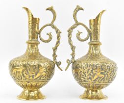 PAIR OF 20TH CENTURY INDIAN BRASS EWERS WITH COBRA HANDLES