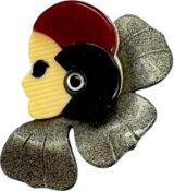 LEA STEIN CELLULOID FLAPPER GIRL BROOCH