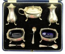 CASED GEORGE V FIVE-PIECE HALLMARKED SILVER & GLASS LINED CRUET SET