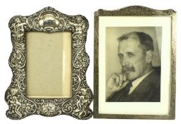 TWO EARLY 20TH CENTURY HALLMARKED SILVER PHOTO FRAMES