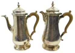 TWO GEORGE V HALLMARKED SILVER COFFEE POTS / WATER POTS