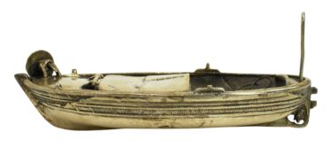 UNUSUAL SILVER MODEL OF A MINIATURE ROWING BOAT