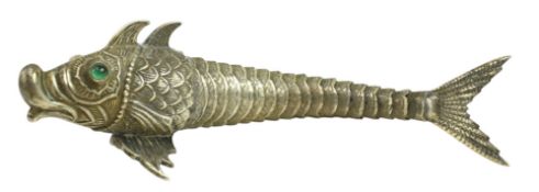 A 20TH CENTURY SPANISH SILVER ARTICULATED FISH WITH EMERALD GLASS EYES