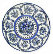 20TH CENTURY PERSIAN BLUE AND WHITE CERAMIC PLATE