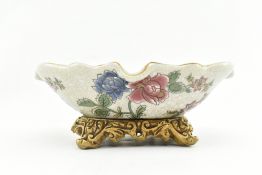 20TH CENTURY CRACKLE GLAZED FAMILLE ROSE DISH ON A STAND
