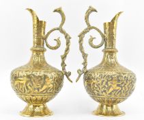PAIR OF 20TH CENTURY INDIAN BRASS EWERS WITH COBRA HANDLES