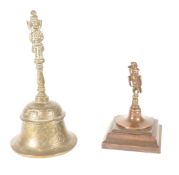 BRASS 19TH CENTURY TOBACCO STOPPER WITH TIBETAN BRASS RITUAL BELL