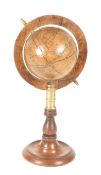 EARLY 20TH CENTURY MINIATURE WOODEN AND BRASS DESKTOP GLOBE