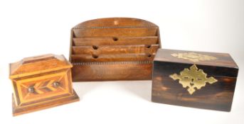 20TH CENTURY WOODEN TEA CADDY ALONGSIDE MONEY BOX AND LETTER RACK