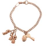A HALLMARKED 9CT GOLD CHARM BRACELET