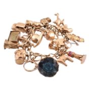 HALLMARKED 9CT GOLD CHARM BRACELET WITH HEART PADLOCK CLASP